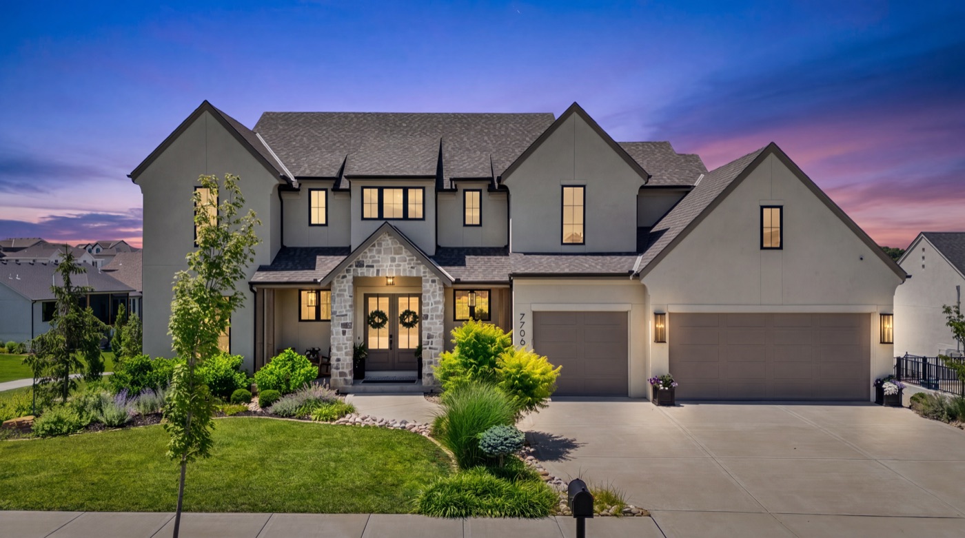 Modern farmhouse at twilight